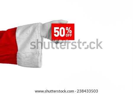 Christmas and New Year discounts topic: Santa's hand holding a red card for a 50 percent discount on an isolated white background