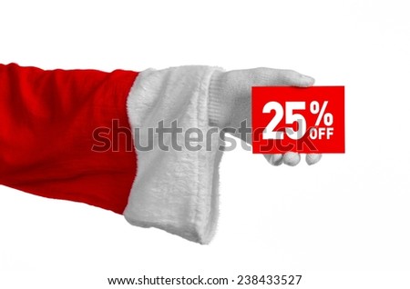 Christmas and New Year discounts topic: Santa's hand holding a red card for a 25 percent  discount on an isolated white background