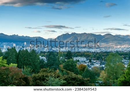 Downtown Vancouver skyline city and mountains view from Queen Elizabeth Park