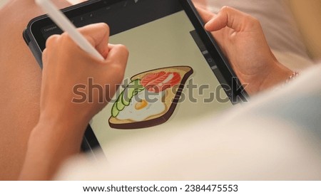 Girl sketching graphic cafe logo close up. Digital illustrator use stylus. Freelance artist work tablet ipad. Woman paint food image. Designer draw pic pencil. Job skill develop app. Person create art