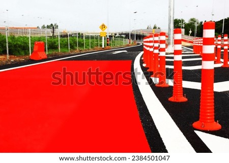 red plastic traffic cones install on traffic lines area warning driver on road be careful