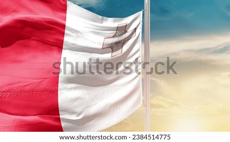 Malta national flag waving in beautiful sky. The flag waving with dynamic angle.