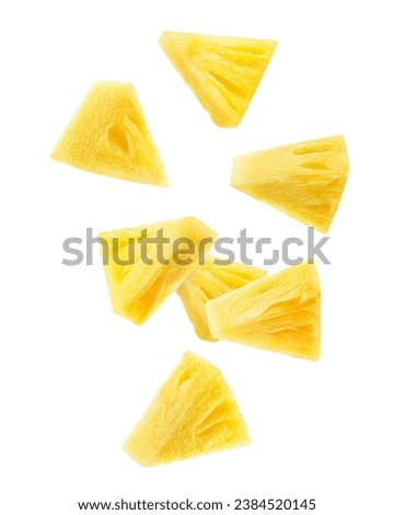 Falling Pineapple slice isolated on white background, clipping path, full depth of field Royalty-Free Stock Photo #2384520145