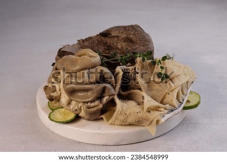 Jeroan Sapi Rebus or Cooked Entrails Beef Organs. Royalty-Free Stock Photo #2384548999