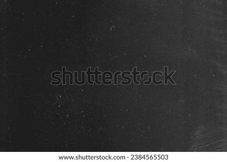 High-quality JPEG showcasing distinctive scratch and dusty textures. Its unique imperfections add a raw and analog feel to designs. Ideal for giving an authentic retro touch to artworks Royalty-Free Stock Photo #2384565503