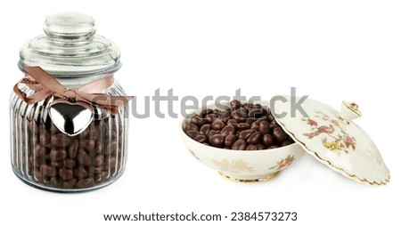 Сhocolate dragee in a glass jar and in a Porcelain box isolated on a white background. Free space for text. Wide photo. Collage. Royalty-Free Stock Photo #2384573273