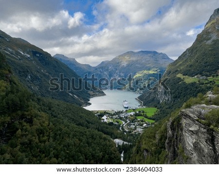 Autumn landscape in Geiranger Fiord valley, south Norway in Europe Royalty-Free Stock Photo #2384604033