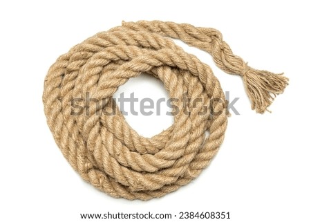 Coiled rope isolated over a white background Royalty-Free Stock Photo #2384608351