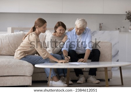Mature 65s spouses buy services, closing deal during formal meeting with manager. Elderly tenants, couple of renters signing rental agreement, put signature of official paper, affirm legal document