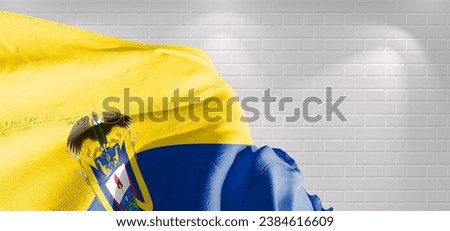 Colombia  national flag cloth fabric waving on beautiful bricks Background.