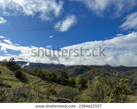 Mountains in autumn with clouds