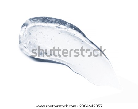 Clear cosmetic gel serum oil texture isolated on white background. Hyaluronic acid skincare moisturizer product with bubbles macro Royalty-Free Stock Photo #2384642857