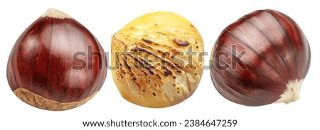 Edible sweet chestnuts with roasted chestnut isolated on white background. Clippingh path. Great food background for your projects. Royalty-Free Stock Photo #2384647259