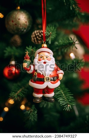 happy santa on christmas tree decoration