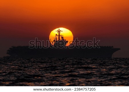 USS George H.W. Bush (CVN-77) USA navy nuclear aircraft carrier at sunset anchored in the Mediterranean sea while visiting Haifa port, Israel for rest and recreation on 4th of July 2017 Royalty-Free Stock Photo #2384757205