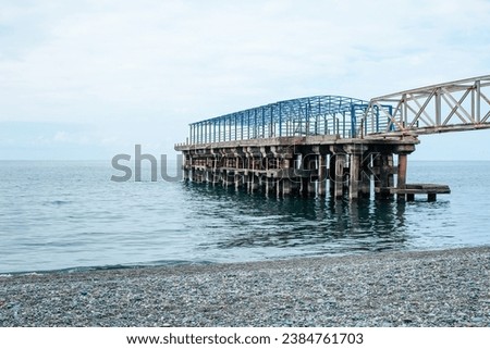 Pier on the sea in Georgia on a cloudy summer day