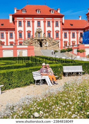 Senior woman with a daughter on excursion in Troja Palace is a Baroque palace Royalty-Free Stock Photo #2384818049