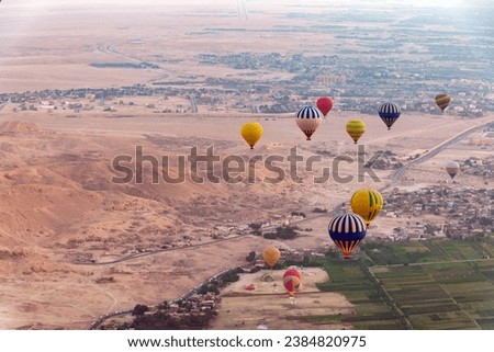 Hot air balloon rides over the west bank of the Nile River. Luxor. Egypt .