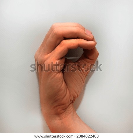 Letter O in American Sign Language (ASL) for deaf people