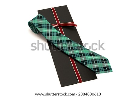 Men's necktie on a white background Royalty-Free Stock Photo #2384880613