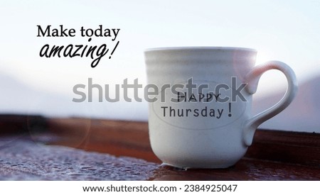 Happy Thursday greeting text on a cup of tea or coffee with business inspirational motivational quote - Make today amazing. Thursday morning spirit. Hello Thursday. Royalty-Free Stock Photo #2384925047