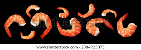 Red boiled shrimp or tiger prawn isolated with clipping path, no shadow on black background, cooked seafood