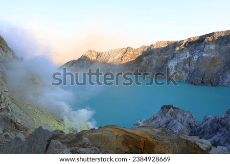 Kawah Ijen volcano (sulfur mine) at Ijen Geopark in the east Java Island, Indonesia  Royalty-Free Stock Photo #2384928669