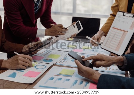 Financial consultant and accounting concept, business consulting meeting in Asia to analyze and discuss financial reporting situation in conference room. Close-up pictures