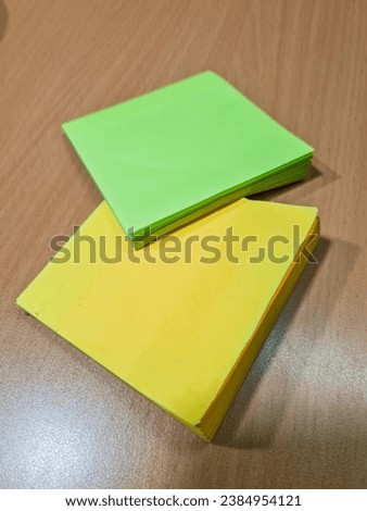 Vibrant Sticky Notes: A colorful and organized arrangement of sticky notes, each displaying unique thoughts and ideas. Perfect for illustrating creativity, and productivity in your project.