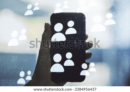Social network media concept and hand with mobile phone on background. Double exposure