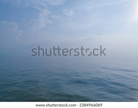 Blue sea with blue sky