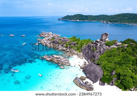 Aerial view of the Similan Islands, Andaman Sea, natural blue waters, tropical sea of Thailand. the beautiful scenery of the island is impressive. Royalty-Free Stock Photo #2384967273