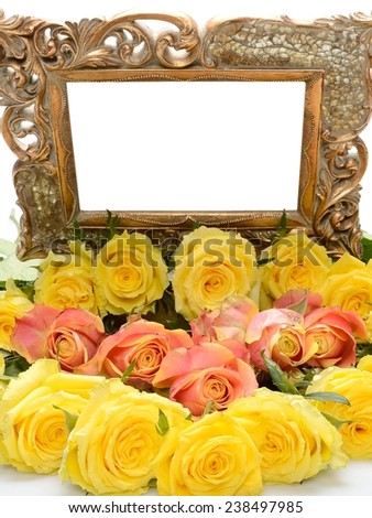 Old a gilded frame for for the congratulatory inscription and yellow roses