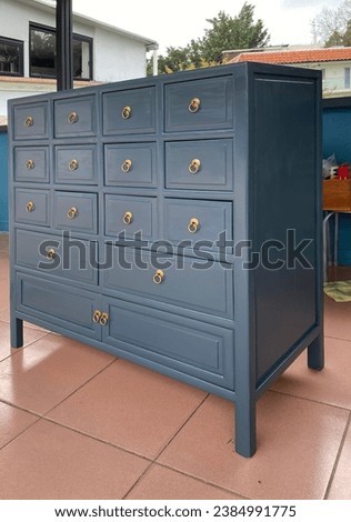 Chinese herbalist Medicinal furniture with multiple draws in different size painted in gray blue colour