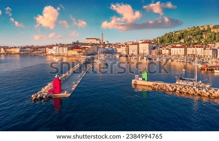 Adorable summer view of Slovenia’s Adriatic coast with beautiful Venetian architecture. Captivating evening cityscape of Piran town. Traveling concept background.
