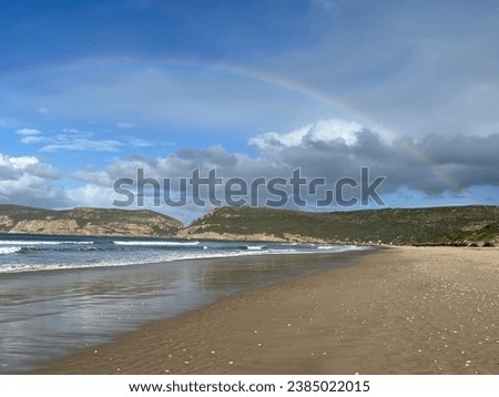 Rainbow over Robberg mountain nature reserve