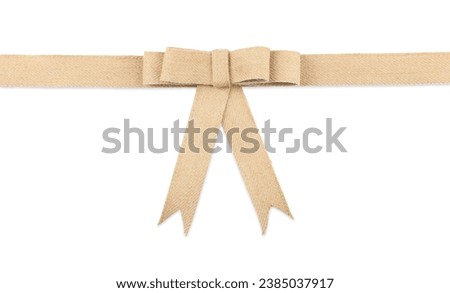 One beautiful burlap bow isolated on white, top view Royalty-Free Stock Photo #2385037917