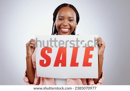Portrait, sale sign or black woman by offer, discount deal or launch for poster or business advertising. Happy, studio or person with board for message, marketing or promotion card on grey background