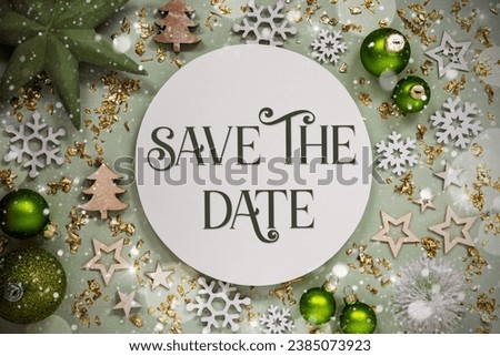 Text Save The Date, Winter Flatlay, Green Christmas Decoration, Background With Snow