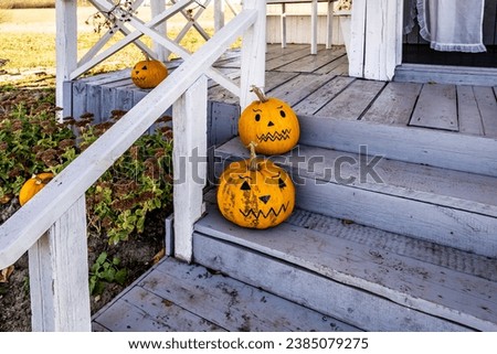 Pumpkins on a wooden threshold, autumn. Halloween.
