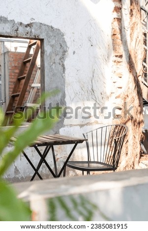
Rest chairs in front of abandoned building outdoors