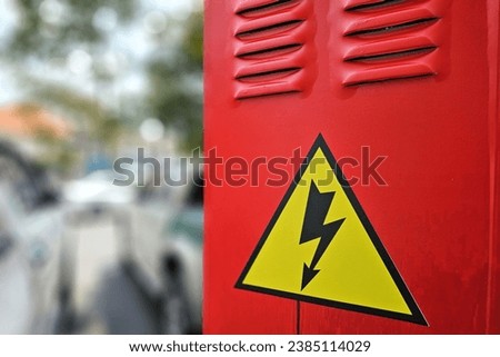 HIgh Voltage Sign on Red Electric Control Box.