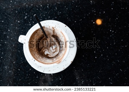 Empty hot chocolate with a stain after finishing drinking. Top view