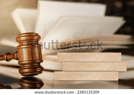 Wooden blocks with Injury Law words. Legal concept