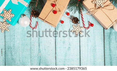 Christmas decoration. Gift boxes and Christmas decorations on red background, flat lay. Top view. Copy space