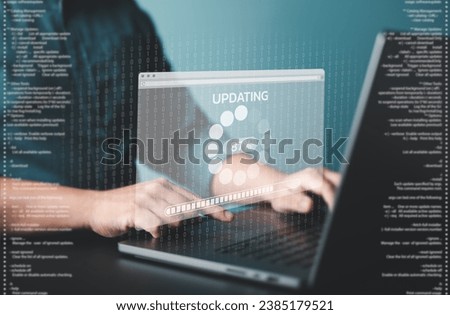 Update software application and hardware upgrade technology concept, Firmware or Operating System update, Man using computer with comfirm button and percent progress bar screen. Installing app patch. Royalty-Free Stock Photo #2385179521