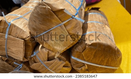 palm sugar wrapped in dry banana leaves