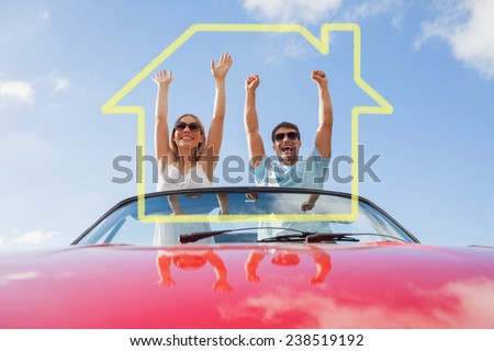 House outline against crazy couple standing in red cabriolet