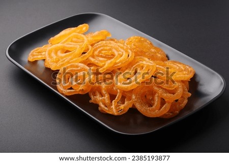 Indian Sweet Jalebi or imarti. Jalebi is one of the most delicious sweets widely used in India. Selective Focus,  Royalty-Free Stock Photo #2385193877