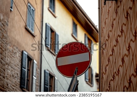 sign on narrow italian street